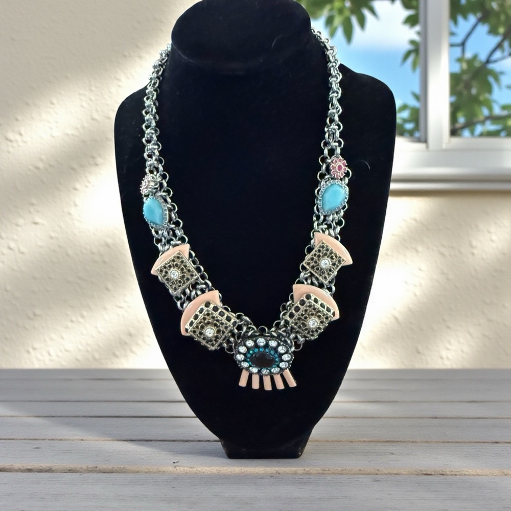 Elegant Silver Necklace with Pink and Blue Details